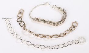 White metal bracelet with sliding ringlets, two other white metal bracelets, 68.9g (3)