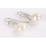 Pair of pearl and diamond earrings, each earring with a hanging pearl above two diamonds, 4g