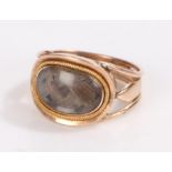 Gold coloured metal ring with central oval woven hair panel, ring size I, 2.6g