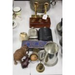 Works of art, to include pair of brass candlesticks, four hip flasks, pewter mug, two carved