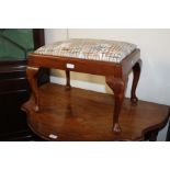 Edwardian mahogany stool, raised on cabriole legs, the seat recently upholstered, 50cm wide,