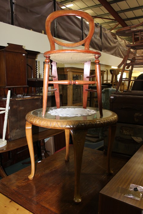 Circular glass-topped cane coffee table, with cabriole carved legs, 72cm diameter, together with