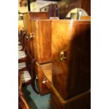 Suite of walnut veneered bedroom furniture, consisting of three wardrobes, a dressing table, two