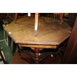 Edwardian rosewood table, the hexagonal top with swag inlay above turned legs, 89cm wide