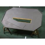 Model railway layout table, the grey table top with rectangular removable panel to the centre,