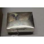 George V silver cigarette box, marks rubbed, the engine turned lis with initials WMD and dated