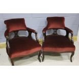Pair of Edwardian armchairs, the scrolling arms above three pierced slats, raised on cabriole legs