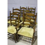 Set of ten 18th Century style oak dining chairs, with ladderbacks raised on turned legs (10)