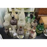 Collection of glass bottles, to include Weston Thomas Beverages Scrubb's, Benbow's Dog Mixture