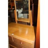 Mid 20th Century teak dressing table with mirror, the rectangular top above four drawers, raised