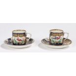 Pair of 19th century porcelain coffee cans and saucers, the blue scale grounds with cartouches of