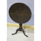 George III mahogany occasional table, circular top above a turned column an cabriole legs, 66cm