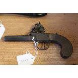 19th Century flintlock pistol, the lock engraved "London", with walnut grip and screw-off barrel,