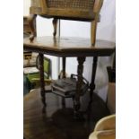 Edwardian mahogany centre table, the octagonal top supported by four turned legs, united by an under