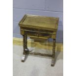Victorian walnut sewing table, the top opening to reveal five compartments and a mirrored reverse,
