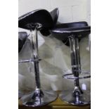 Pair of black leather adjustable bar stools (2)