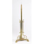 Early 20th Century telescopic standard lamp, the brass lamp with a central column and scroll