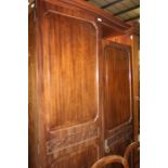 Early 20th Century mahogany wardrobe, with twin doors above a plinth base, 108cm wide