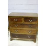 Edwardian mahogany chest of five drawers, with two short and three long, raised on bracket feet,