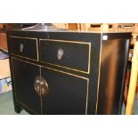 Mid 20th Century Chinese style cabinet, the rectangular top above two drawers and two panelled