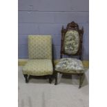 Two early 20th Century upholstered chairs, raised on turned mahogany legs, both on castors, 102cm