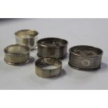 Five silver napkin rings, various dates and makers, 2.7oz (5)