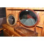 Edwardian dressing mirror, the base with three drawers, raised on feet, together with an oval gilt