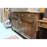 Mid-century oak sideboard, in 18th Century style, with two frieze drawers above two panelled