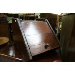 Edwardian mahogany coal bucket, with turned carrying handle and hinged lid, 34cm wide