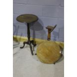 Two Victorian occasional tables, the circular tops raised on turned columns, one with cabriole