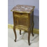 Eary 20th Century mahogany pot cupboard, with a red marble top above a drawer and panelled door,