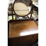 Early 20th Century mahogany chest of drawers, with a mirror above three drawers raised on square