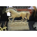 Pair of cast metal door stops, modelled as a horse in profile, 28cm wide, 29cm high