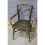 Early 20th Century Thonet beech elbow chair, the curved back with a crest rail, above a seat with