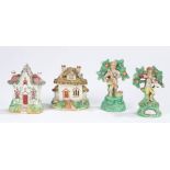 19th Century Staffordshire, to include two figures standing on green bases, an incense cottage and