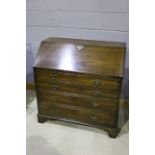 19th Century mahogany bureau, the fall opening to reveal a fitted interior and green leather writing