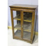 Victorian pollard oak display cabinet, the hinged doors opening to reveal two shelves, with a finely