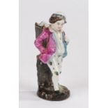 Late 19th Century porcelain figure, the figure walking with a basket to his back, incised marks to