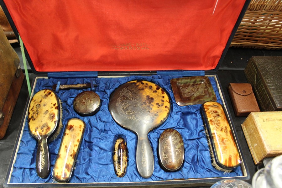 Faux tortoise shell dressing table set, consisting of , hand mirror, hair brush, clothes brush, nail