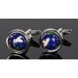 Pair of cufflinks, with a pair of swivel globes to the heads