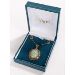 9 carat gold and jadeite pendant together with a pair of matching earrings, gross weight 7.3g
