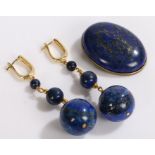 Pair of lapis lazuli earrings, with three graduated spheres in gilt paste set mounts, similar oval
