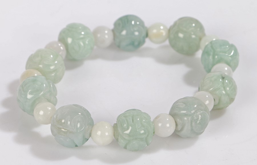 Jade bracelet, with carved pale green beads and white beads - Image 2 of 2