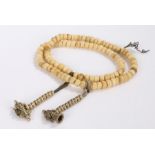 String of bone prayer beads, 80cm long