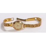 Accurist 9 carat gold ladies wristwatch, the signed cream dial with Arabic and baton markers, manual