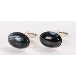 Pair of banded agate cufflinks, the heads of oval form