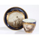 Meissen cup and saucer, 19th Century, the central image to the saucer depicting a mother and child