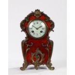 French tortoiseshell bracket clock, retailed by Waring & Gillow Ltd, London, the case with a waisted