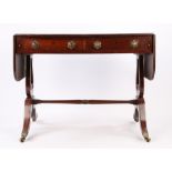 Regency mahogany sofa table, the rectangular top with drop flaps above a pair of frieze drawers