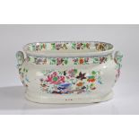 Victorian Ironstone footbath, with a polychrome flower and fence design and scroll handles, 47cm